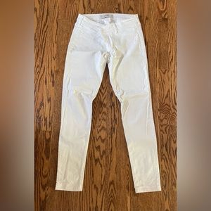 Hollister women’s white skinny jeans.
